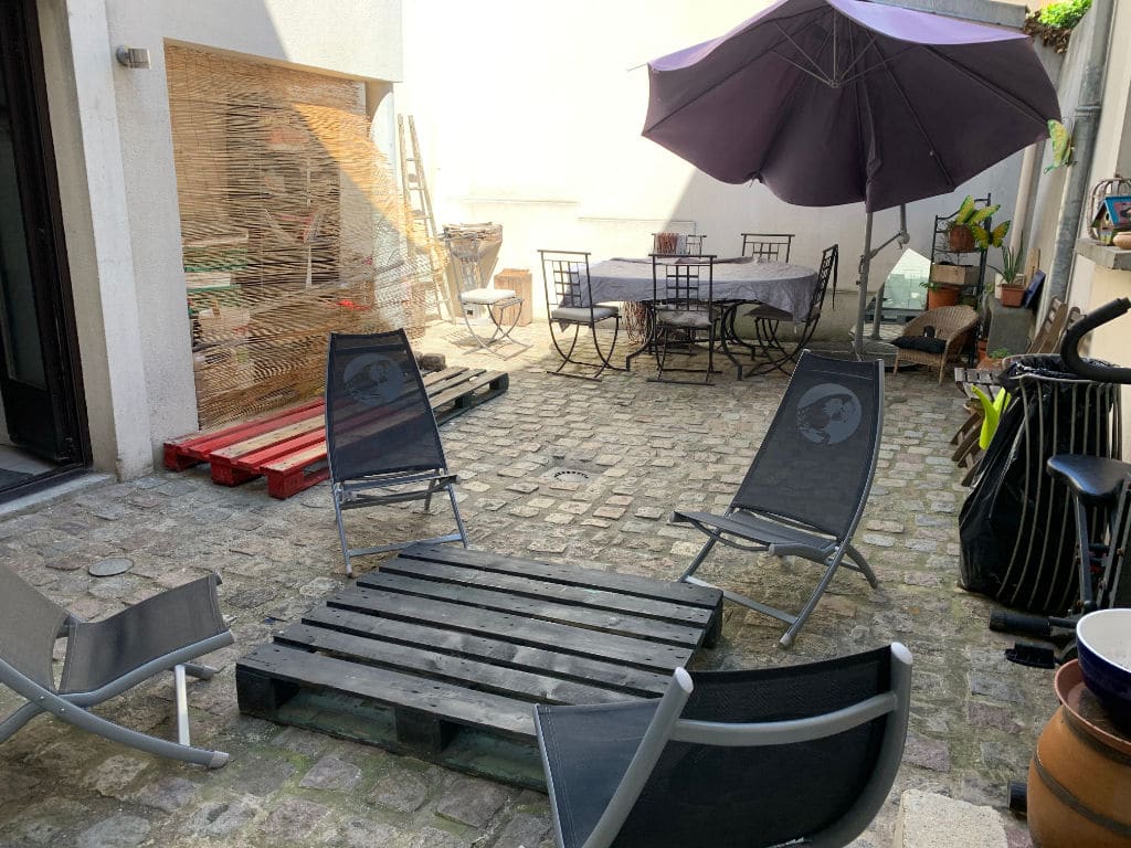 agence immo maisons-alfort - 190 m², cour intérieure pavée à l'ancienne
