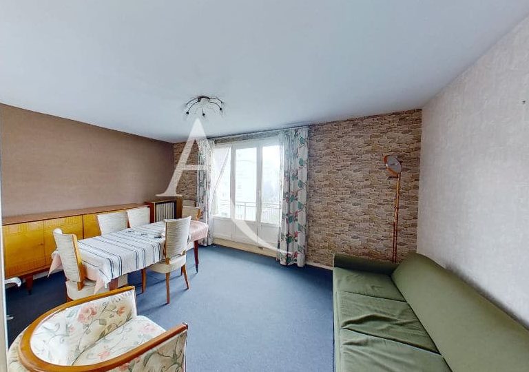 immobilier acheter: appartement 4 pièces 66 m², séjour avec grande porte-fenêtre et balcon